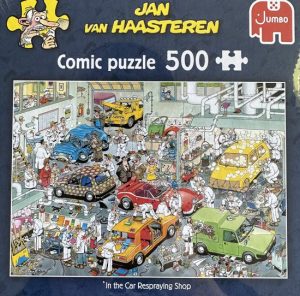 Jumbo puzzel Jan van Haasteren comic puzzle 500 stukjes in the car respraying shop in de autospuiterij